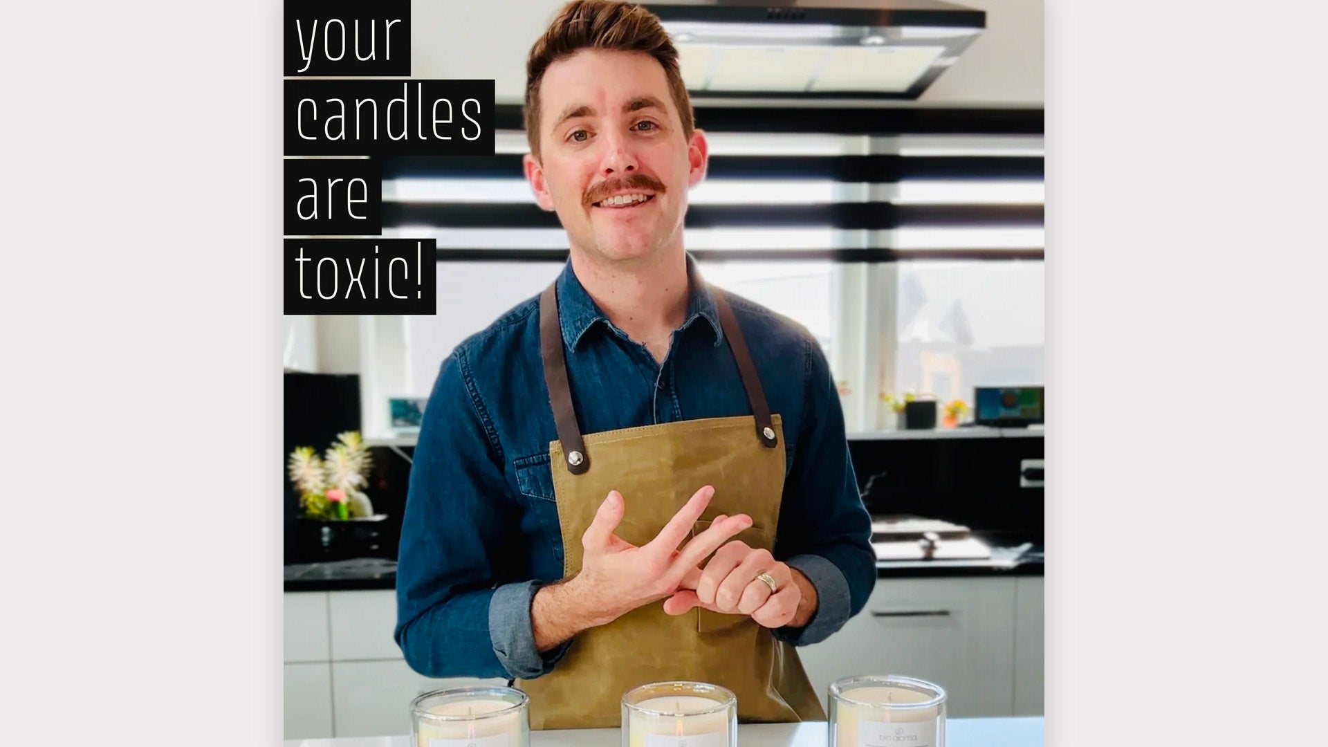 Load video: Founder of brn aroma standing in front of candles and explaining the danger of candles.